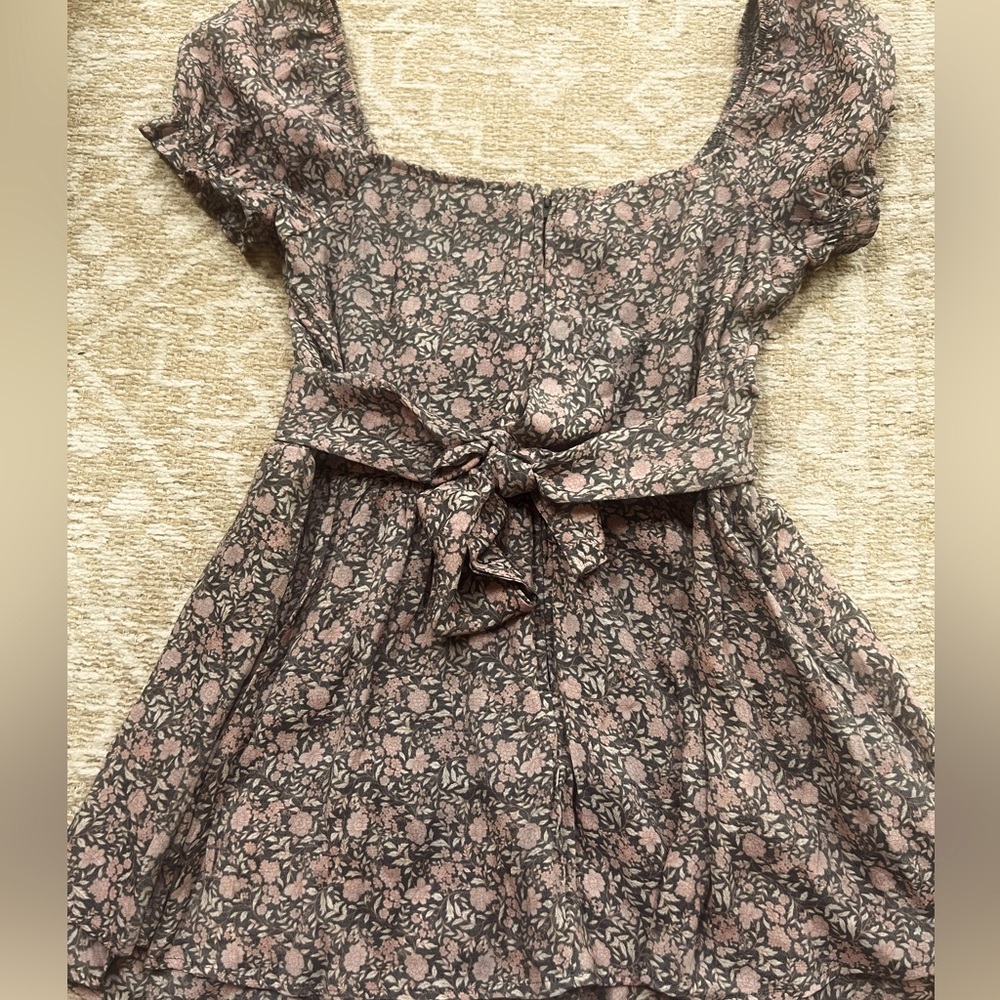 Romper dark blue w/pink flowers Francesca's